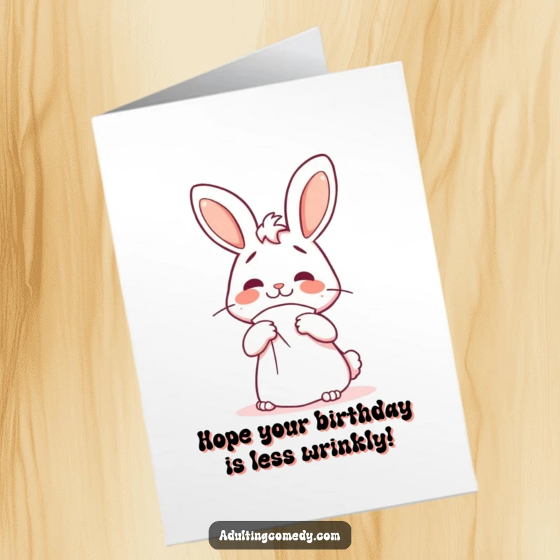 Funny Free Printable Birthday Card: Confused bunny wrestling with a giant napkin, a hilarious DIY birthday greeting.