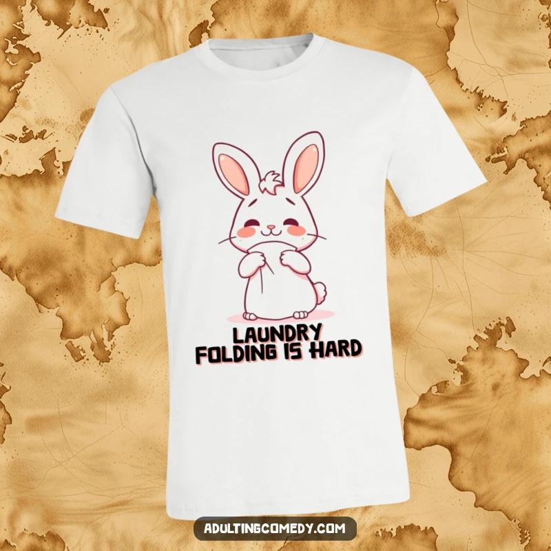 Funny bunny t-shirt showing a cheerful rabbit with a confused look, struggling to fold an oversized napkin, for a funny gift.
